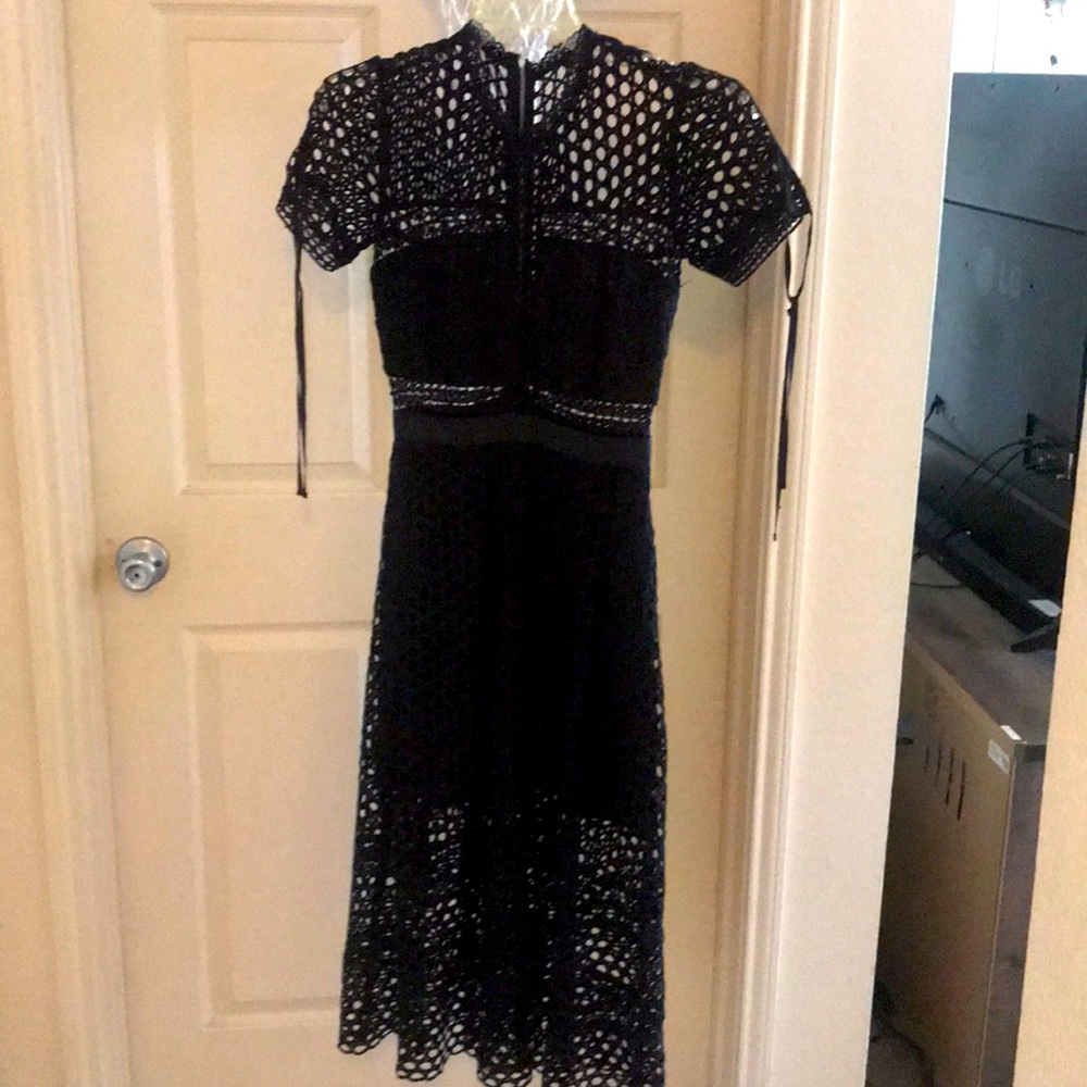A Unique Black Crochet Dress
